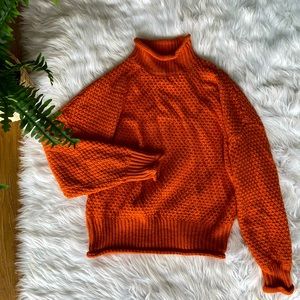 Oversized cable knit turtle neck sweater